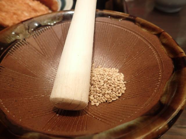 Sesame seeds with mortal and pestle at Hamakatsu