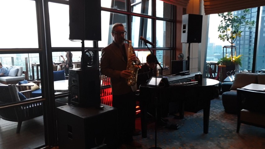 Jazz band playing inside at Spectrum Rooftop Bar