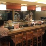Watching the sushi chefs at Kizuna Sushi Restaurant Tokyo