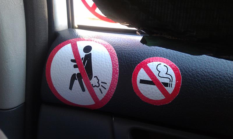 No farting and no smoking sign in Bangkok taxi