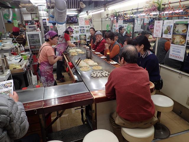 Small stalls selling Okonomiyaki in Hiroshima