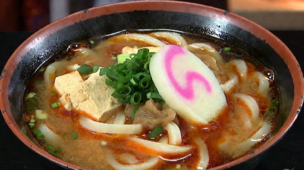 Bowl of Miso Nikomi Udon Nagoya specialty, thick noodles in rich miso broth