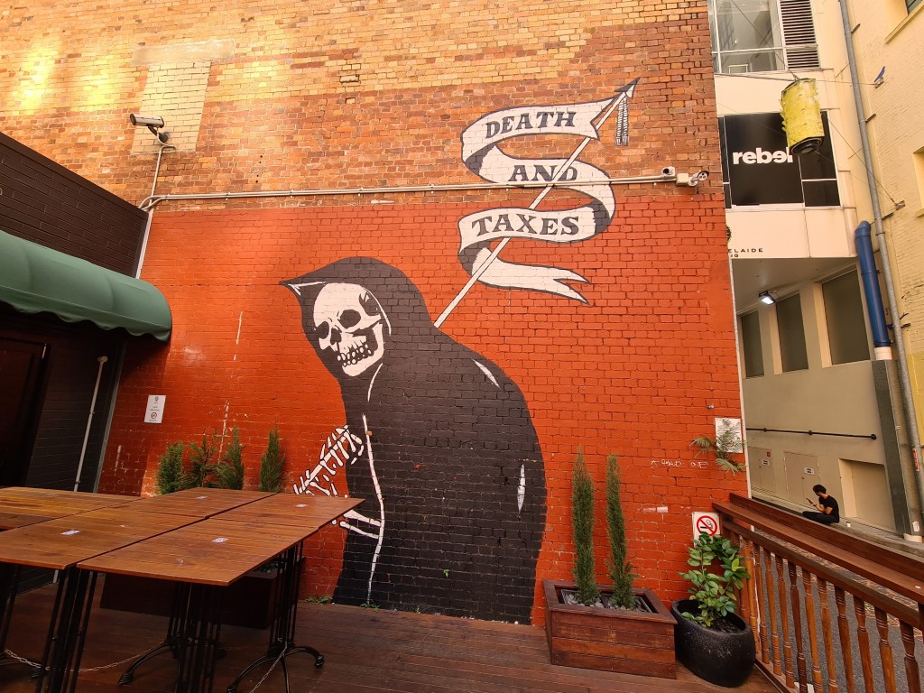 Death and Taxes Street Art on Burnett Lane