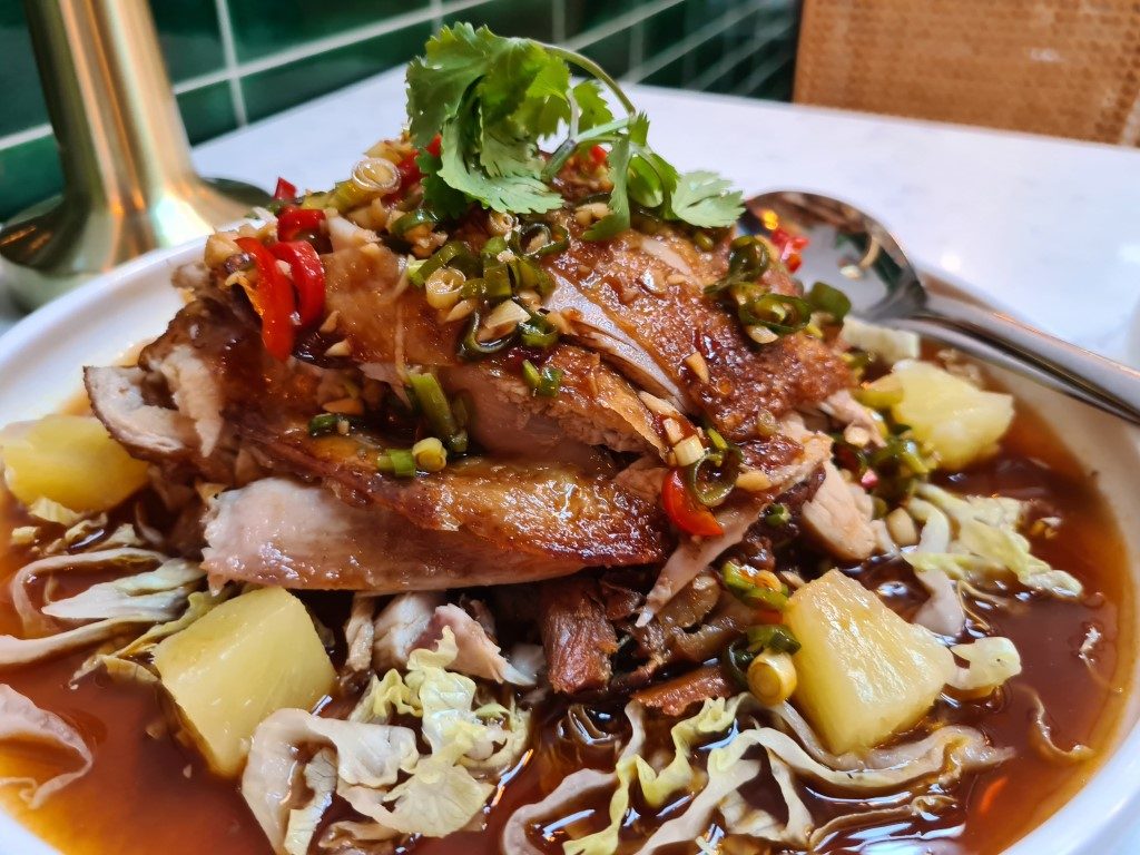 Delicious Crispy Skin Chicken with golden skin and juicy meat served at Tao Chinese Restaurant in Sydney CBD