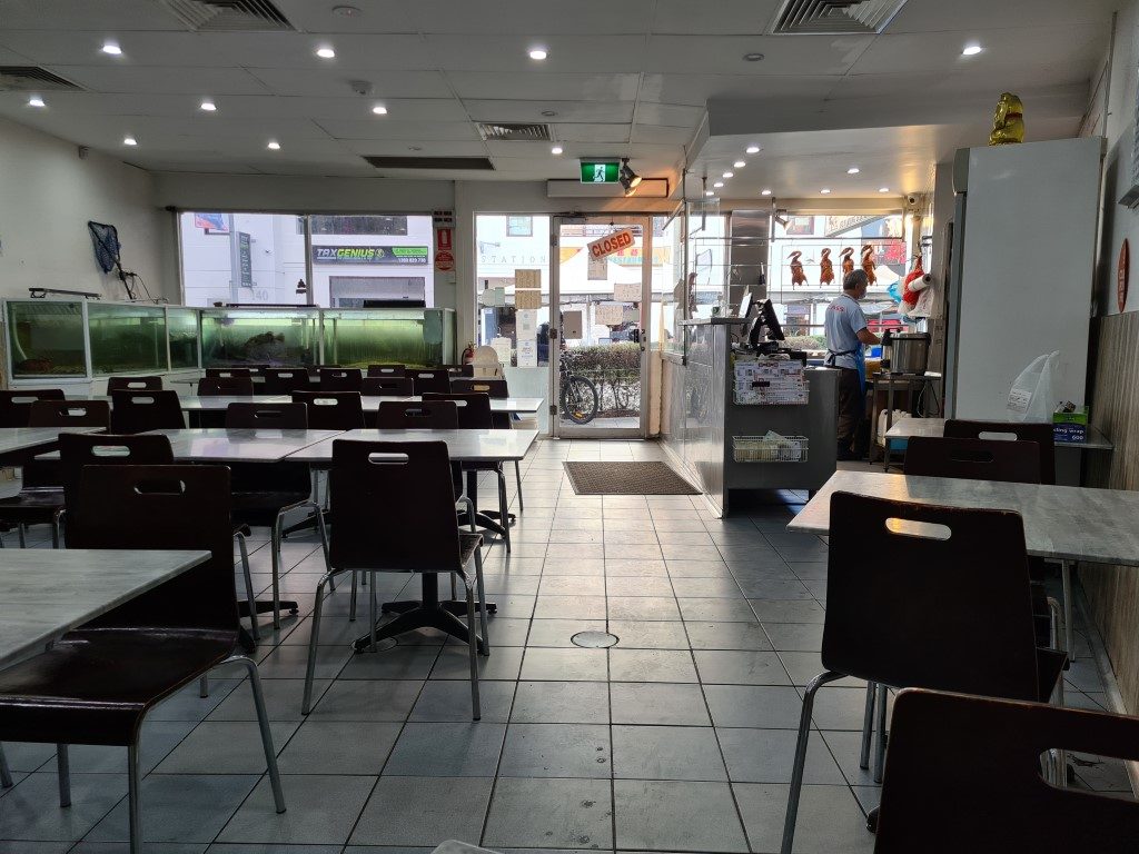 Interior of Sun Ming BBQ Restaurant Parramatta – authentic Cantonese dining room with BBQ meats, fish tanks, and traditional setup on Church Street
