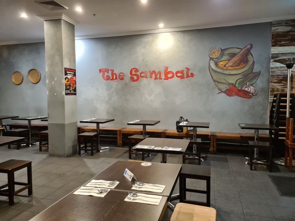 Inside dining area and interior decor at The Sambal Indonesian Restaurant in Sydney CBD, Australia