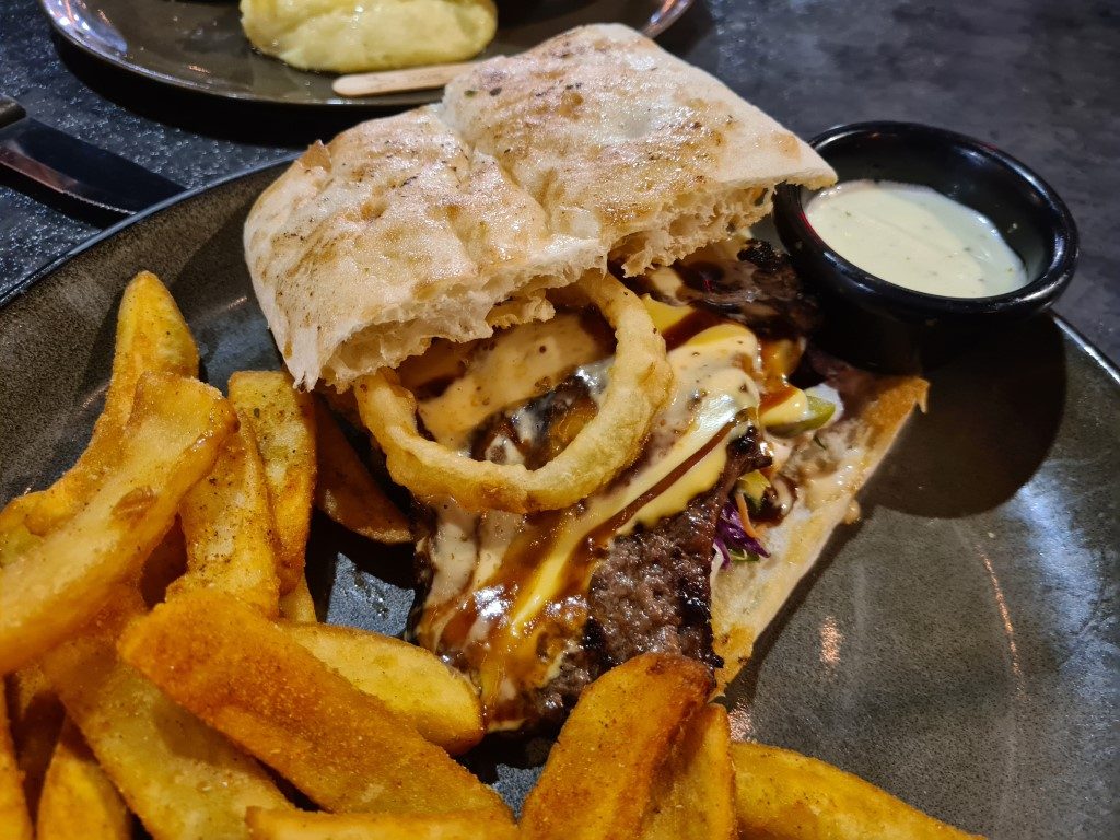 Steak sandwich with tender Angus steak on Turkish bread at Volcano's Steakhouse Parramatta – loaded Halal beef sandwich