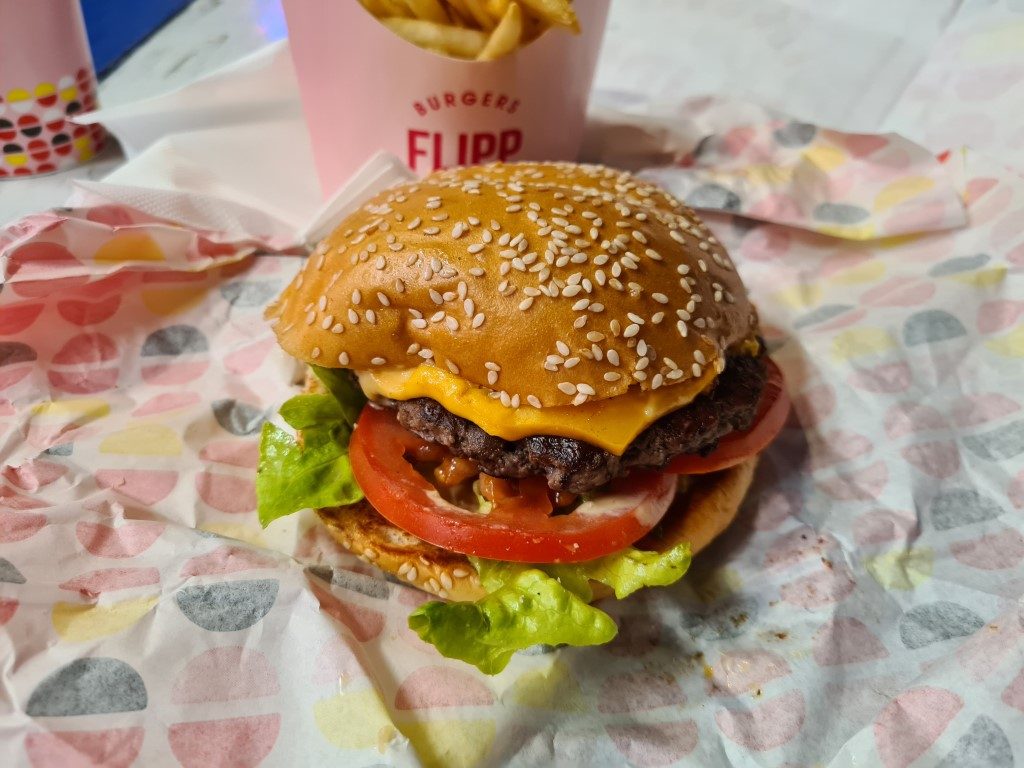 Flipp Burger beef burger with melted cheese and fresh toppings from Flipp Burger Parramatta