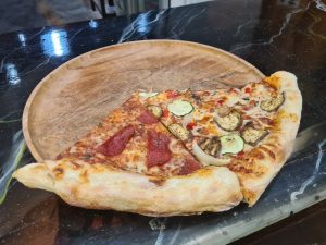 Pizza by the slice at Pepino Pizzeria in Canggu Bali