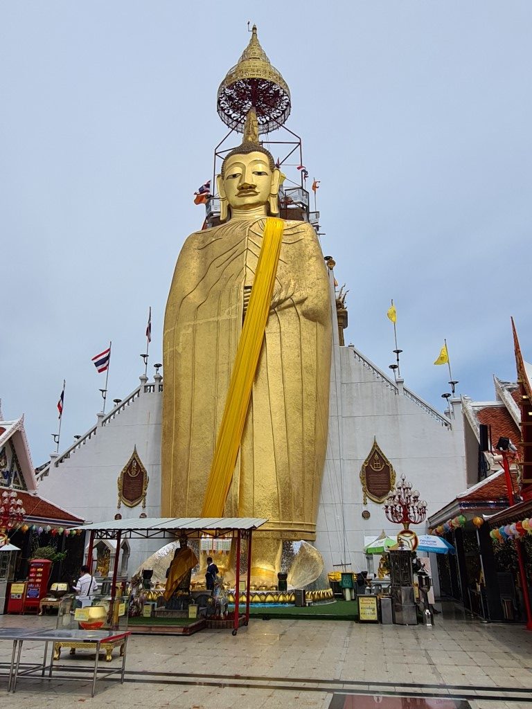 Standing Buddha in Bangkok at Wat Intharawihan
