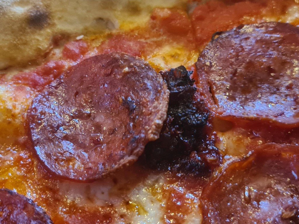 Extra chili on Diavola pizza at Vesuvio Pizza Bangkok