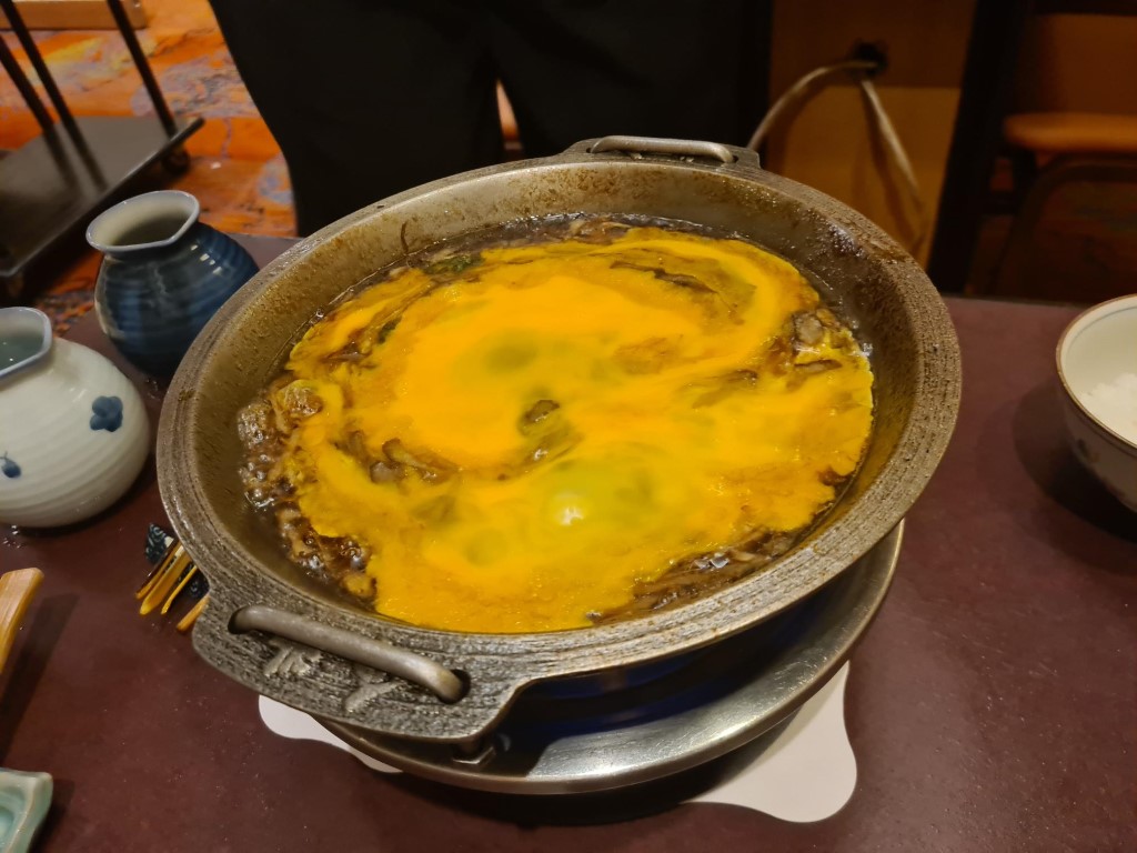 Egg cooked in Sukiyaki sauce at Imahan Sukiyaki Restaurant Nishi-Shinjuku