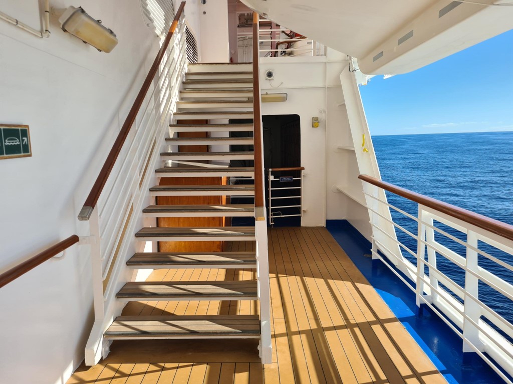 There are steps you have to navigate to walk right around the ship