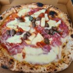 Take-away pizza from Ollie's Italian Restaurant Cairns