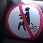 Funny sign in a taxi in Bangkok