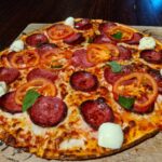 Delicious thin crust pizza at Bondi Pizza Parramatta