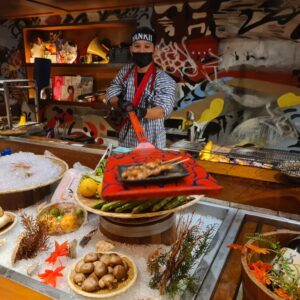 Chefs handing the food at Yankii Robatayaki Restaurant Bangkok